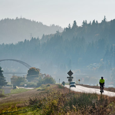 photo of the Sauvie Island Bridge and a cyclist