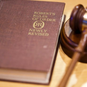 photo of a Robert's Rules book and gavel