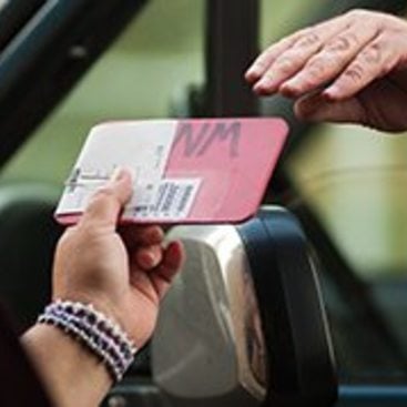 photo of a payment exchange at a transfer station