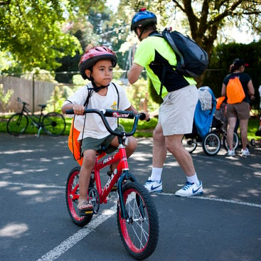 A child learns to bicycle to school