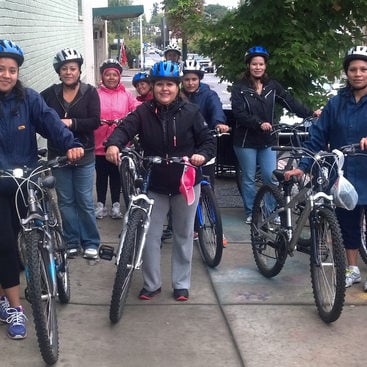 photo of bike riders in downtown Forest Grove