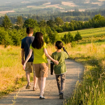 photo of a family walking at Cooper Mountain Nature Park