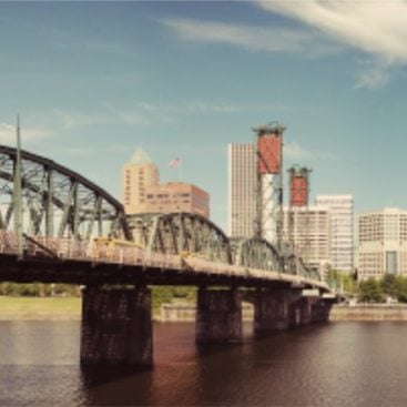 Hawthorne Bridge with downtown Portland skyline in background