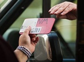 photo of a payment exchange at a transfer station