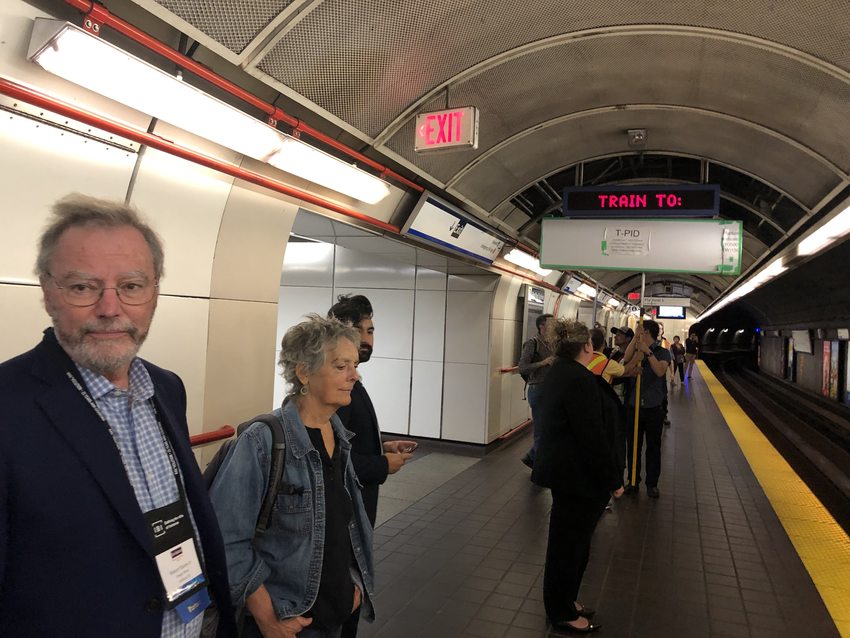 Bob and Adrienne Stacey (left) and Juan Carlos González at a subway station