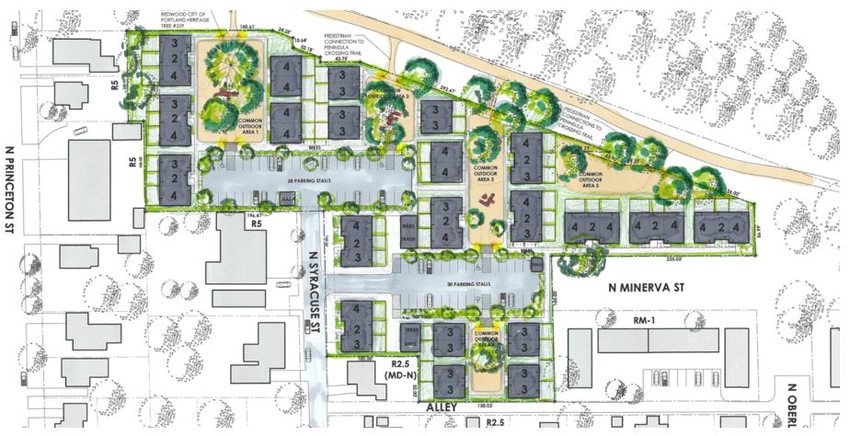 Aerial site place of a residential development with parking, trees and and common areas.