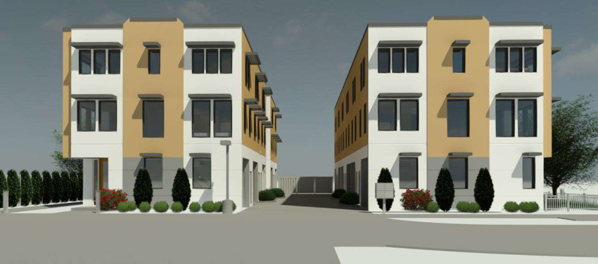 Archirtectural rendering of two three-story residential developments surrounded by parking lot.