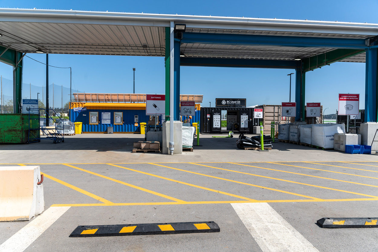 Stalls at a reuse facility were people can recycle batteries, motor oil, lightbulbs, electronics and more