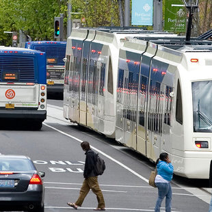 MAX and bus thumb downtown portland