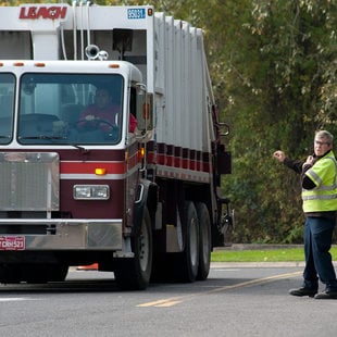 photo of a garbage truck coming into Metro South