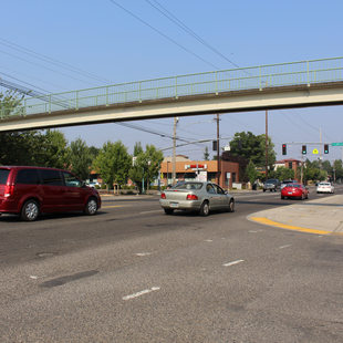 pedestrian overpass bridge at Southeast Division Street and 85th Avenue in the Jade District