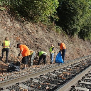 Photo of RID Patrol and cleanup crews along the railroad