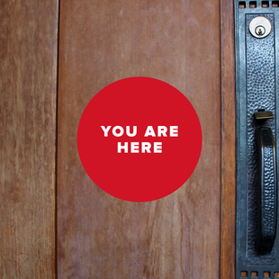 You are here logo with door knob 