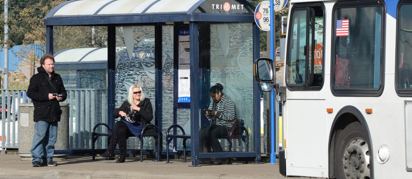 Waiting for a bus near Bridgeport Village