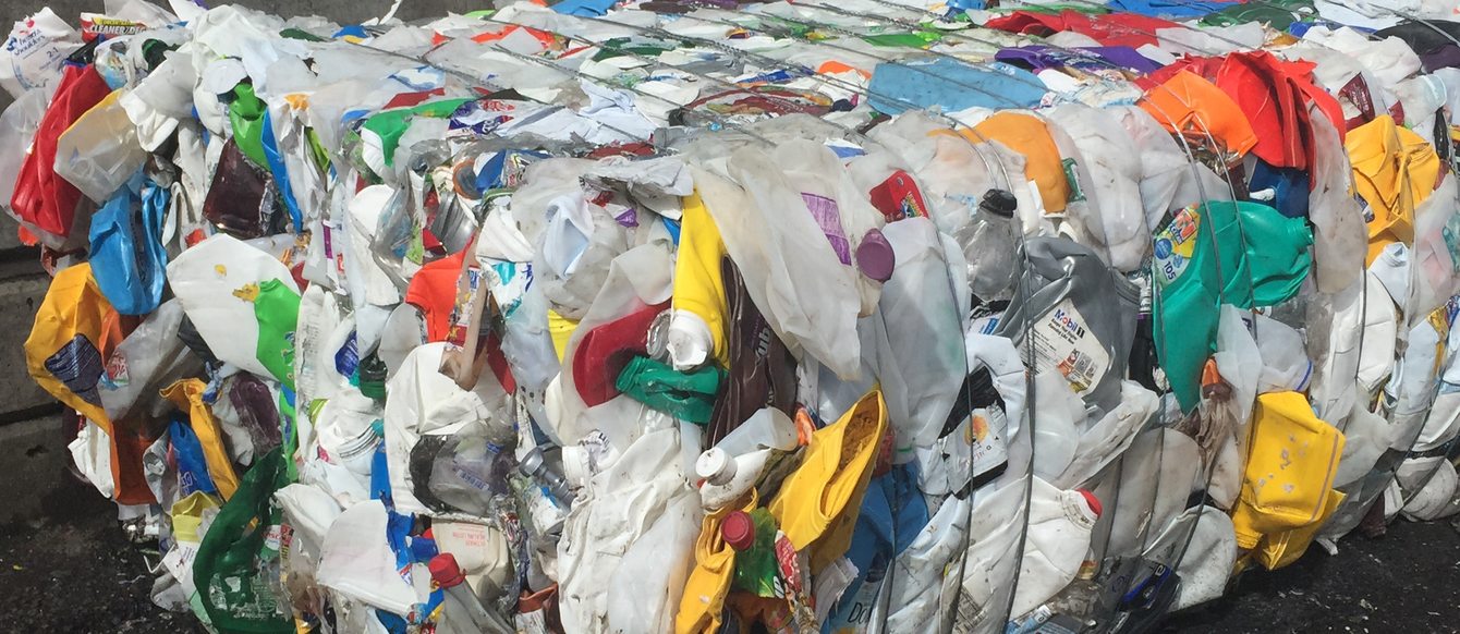 photo of plastic items baled for recycling