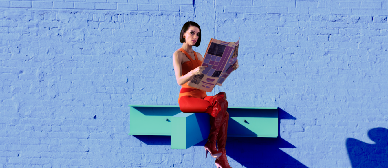 artistic image of Annie Clark from Saint Vincent reading a newspaper