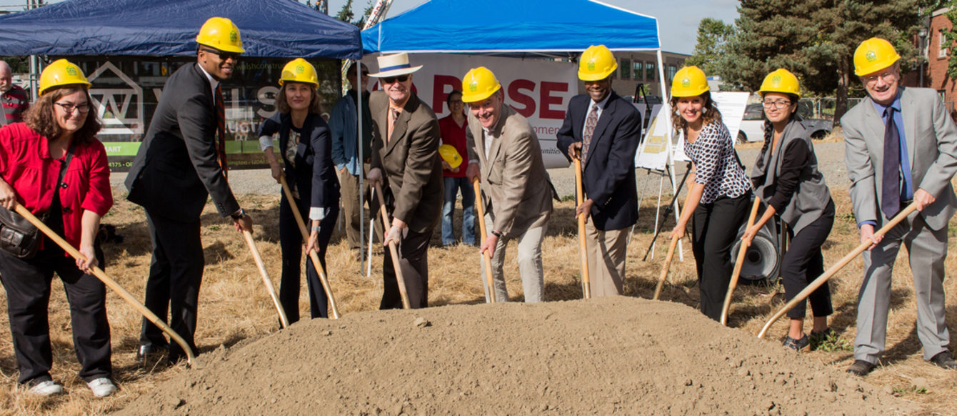 Councilor Bob Stacey with other business and civic leaders holding shovels at the groundbreaking of a new construction project