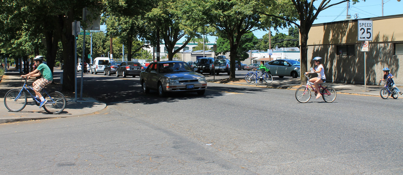 bicyclist crossing North Ivanhoe Street in St.Johns