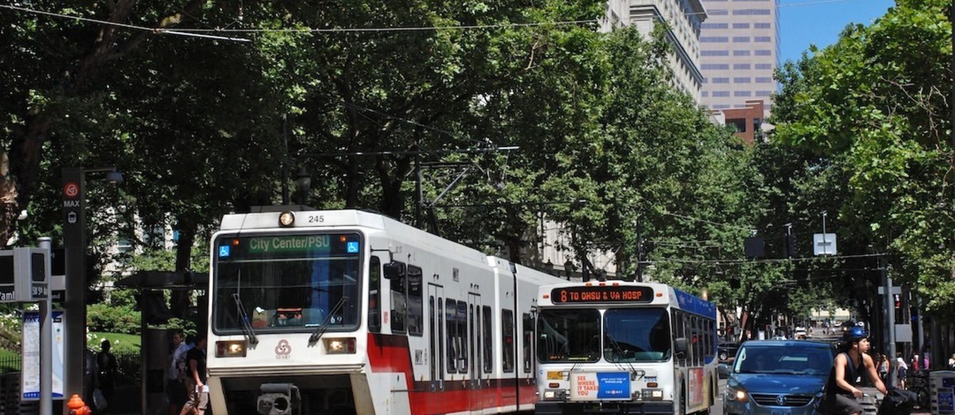 MAX, bus, walkers and bicycle riders in downtown Portland