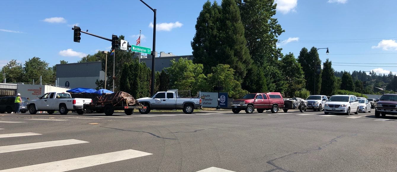 long lines of cars waiting to get into Metro South transfer station