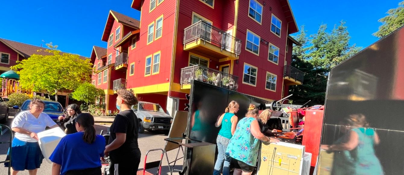 Large household items being collected at an apartment community