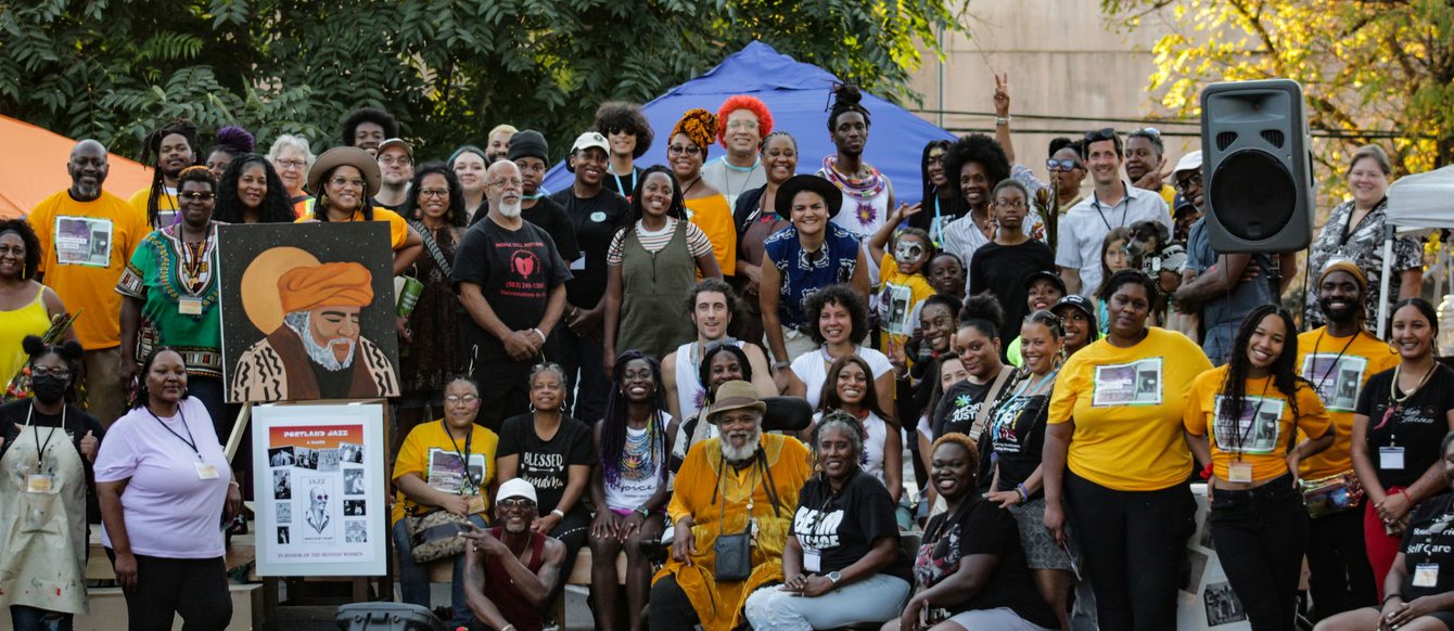 Group poses at Afro-topia