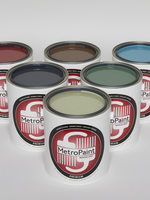 6 cans of paint with MetroPaint labels are arranged in a pyramid. The paint can lids are removed to show the colors of paint inside the cans, which are shades of green, brown and blue.