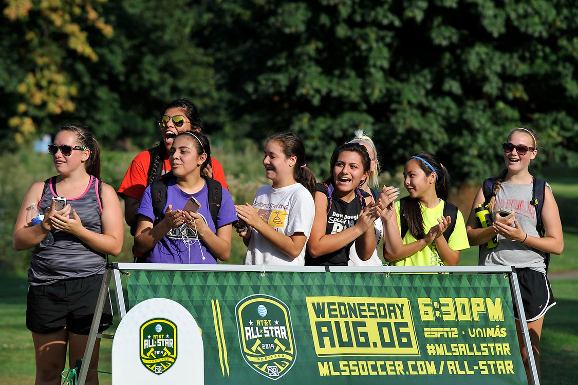 Fans cheer at footgolf