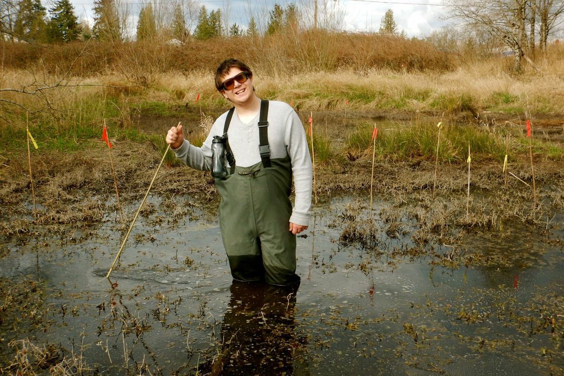 photo of YEC youth doing amphibian monitoring