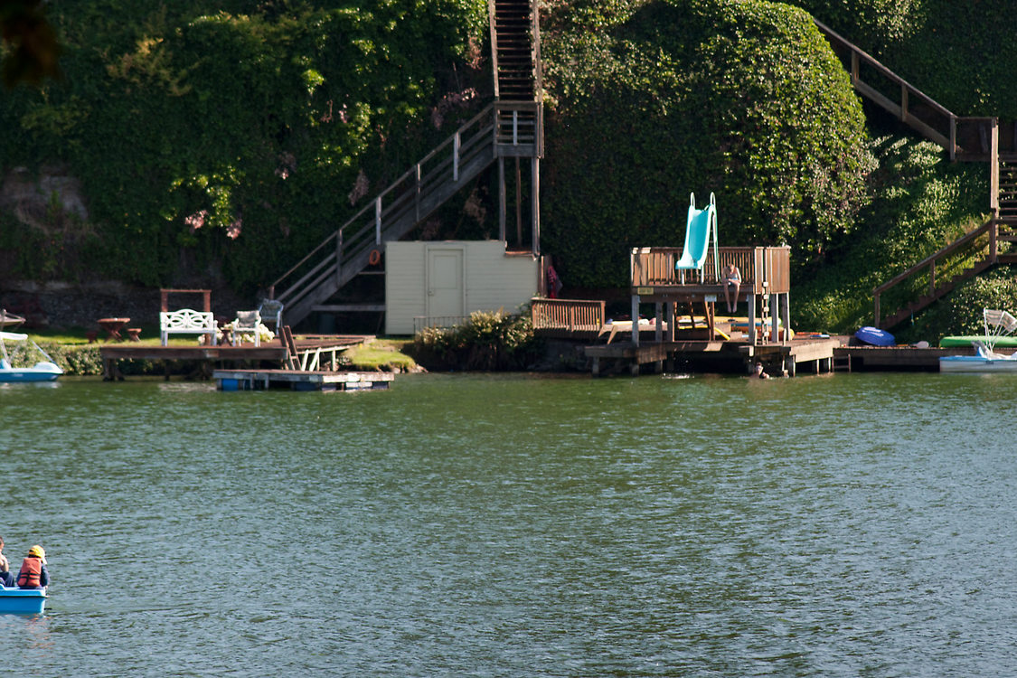 photo of blue lake paddleboat