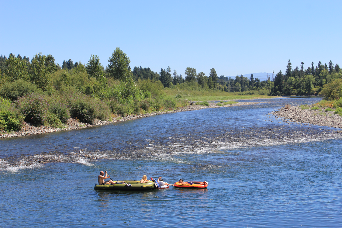 two rafts floating down Clackamas River