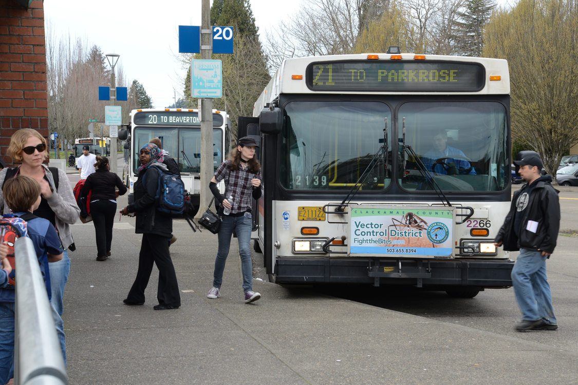 Gresham Transit Center bus and riders