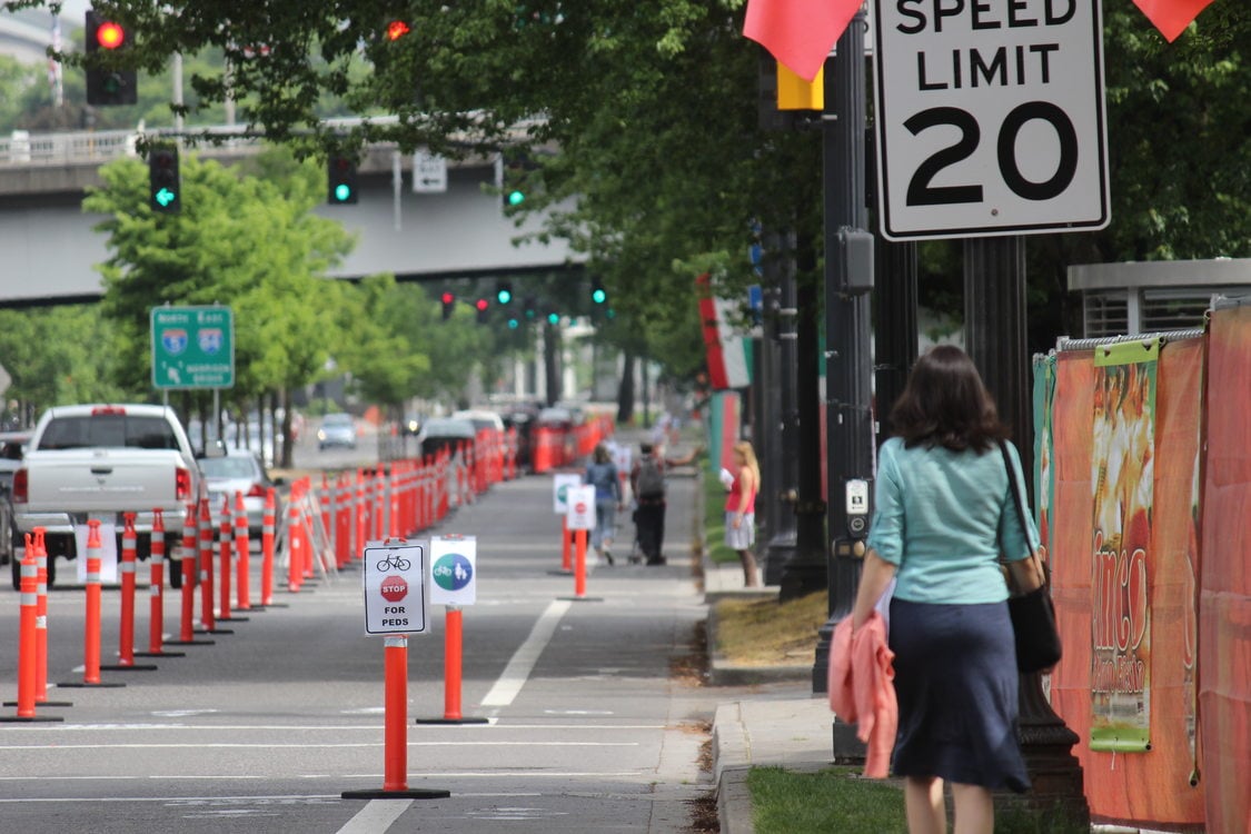 photo of a lane on Naito Parkway converted to open space for the public to walk and bike safely during Better Naito