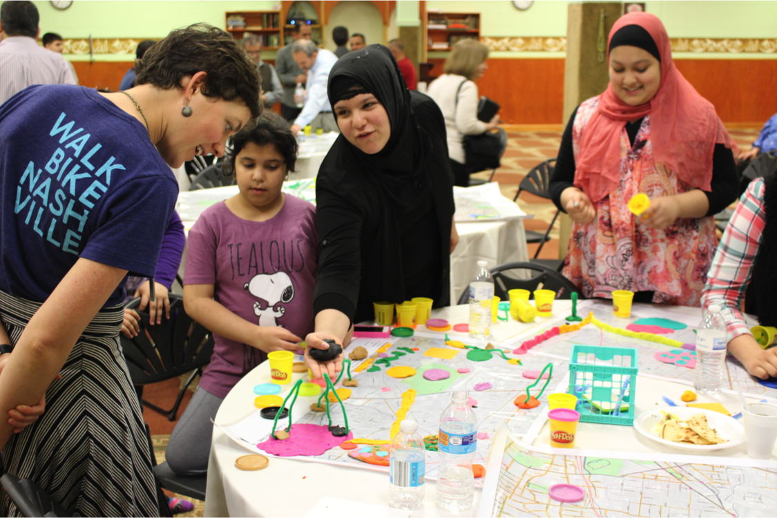 photo of participants at a placemaking craft activity in Nolesville Pike, Nashville