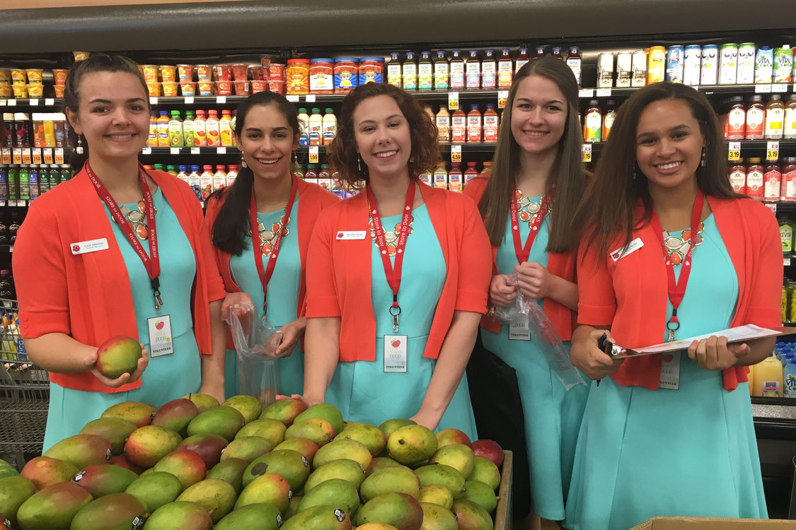 volunteers shop for groceries