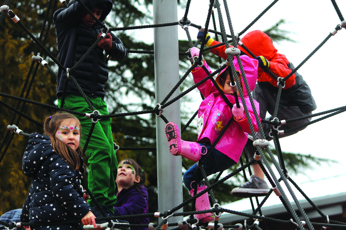 children playing on a structure at Orenco Woods Nature Park