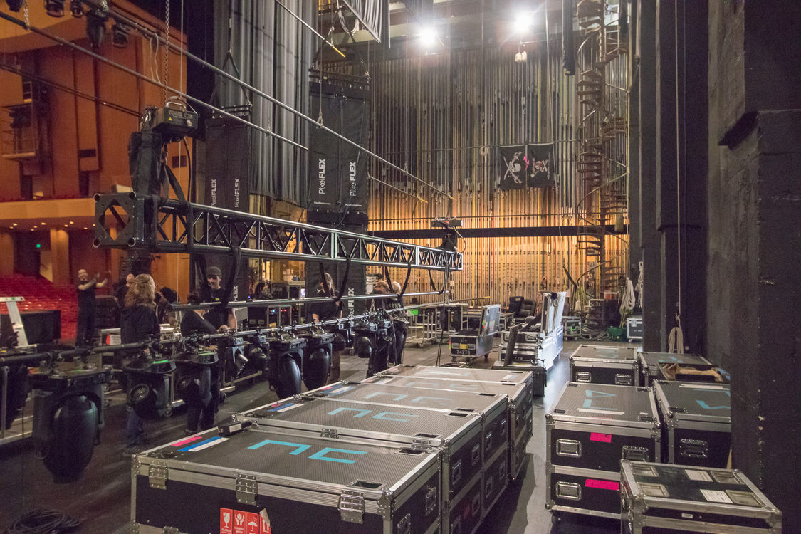 RAIN crew work on stage lights