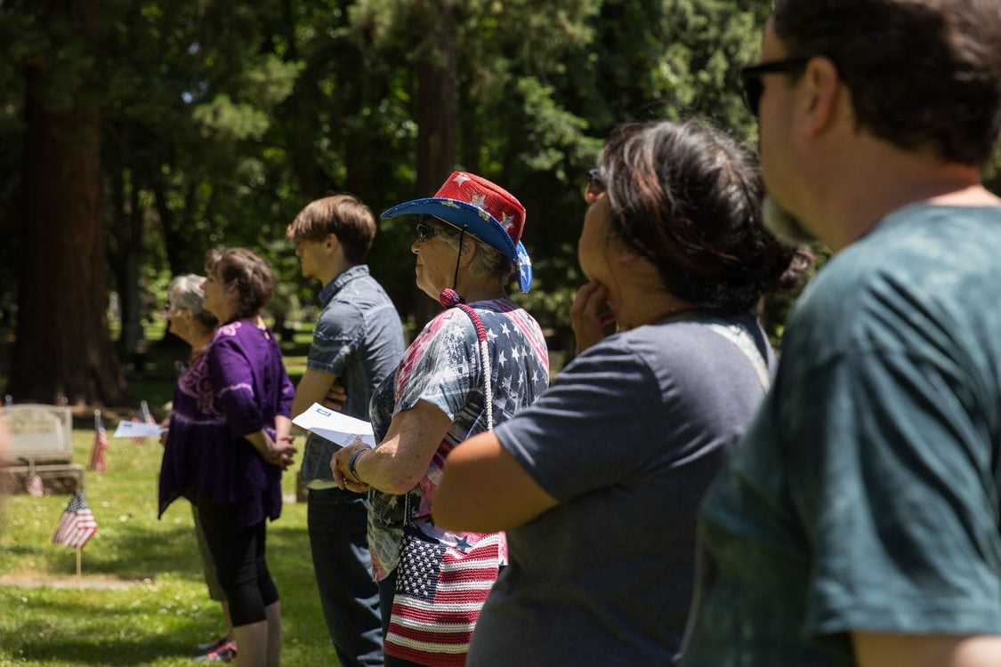 People gathered at Lone Fir Cemetery on Memorial Day