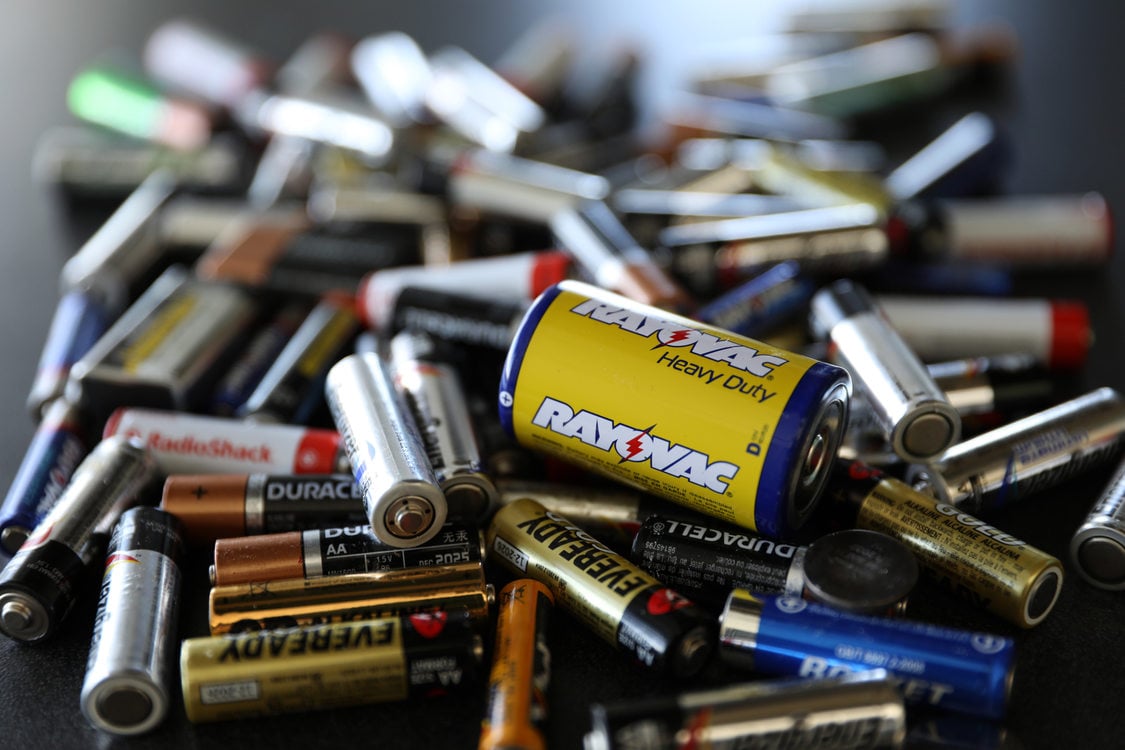 closeup of discarded batteries