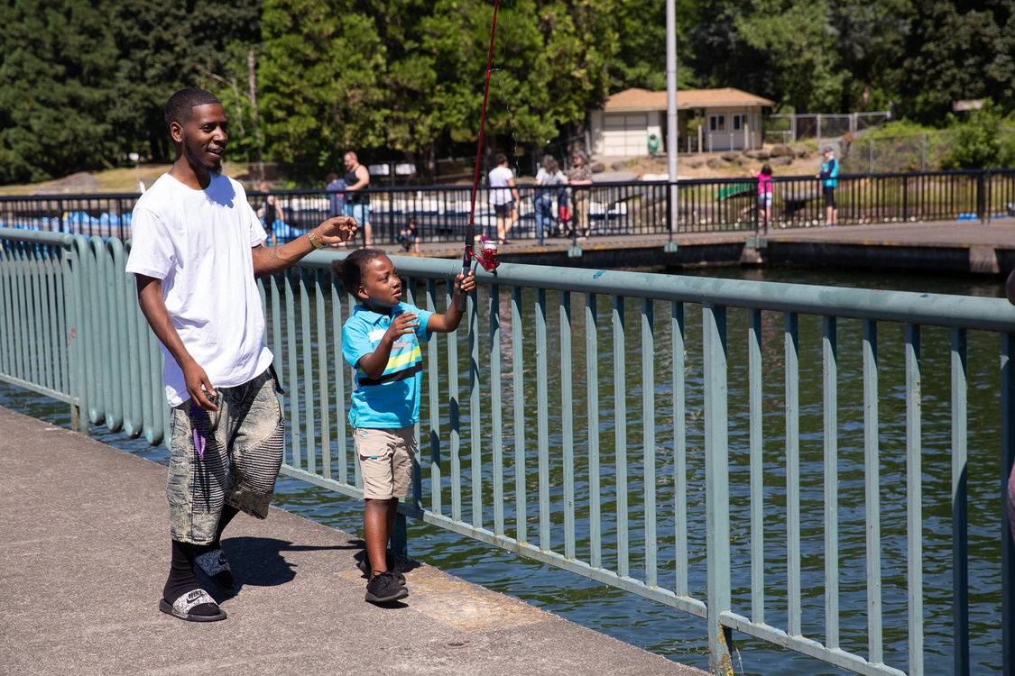 Father and son fishing at Blue Lake Regional Park