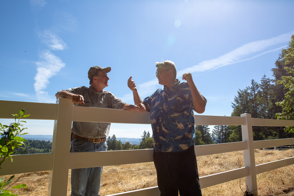 Jim Carlson and Bruce Ellis have a conversation at Mason Hill 