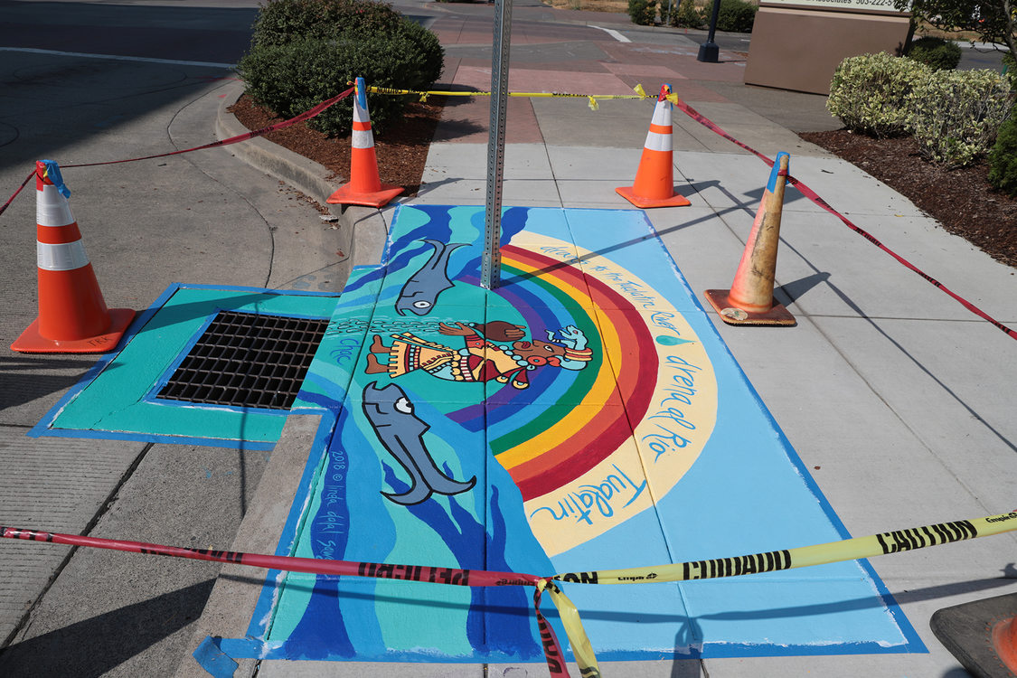 Placemaking mural image depicting the Mayan rain god Chac and a river