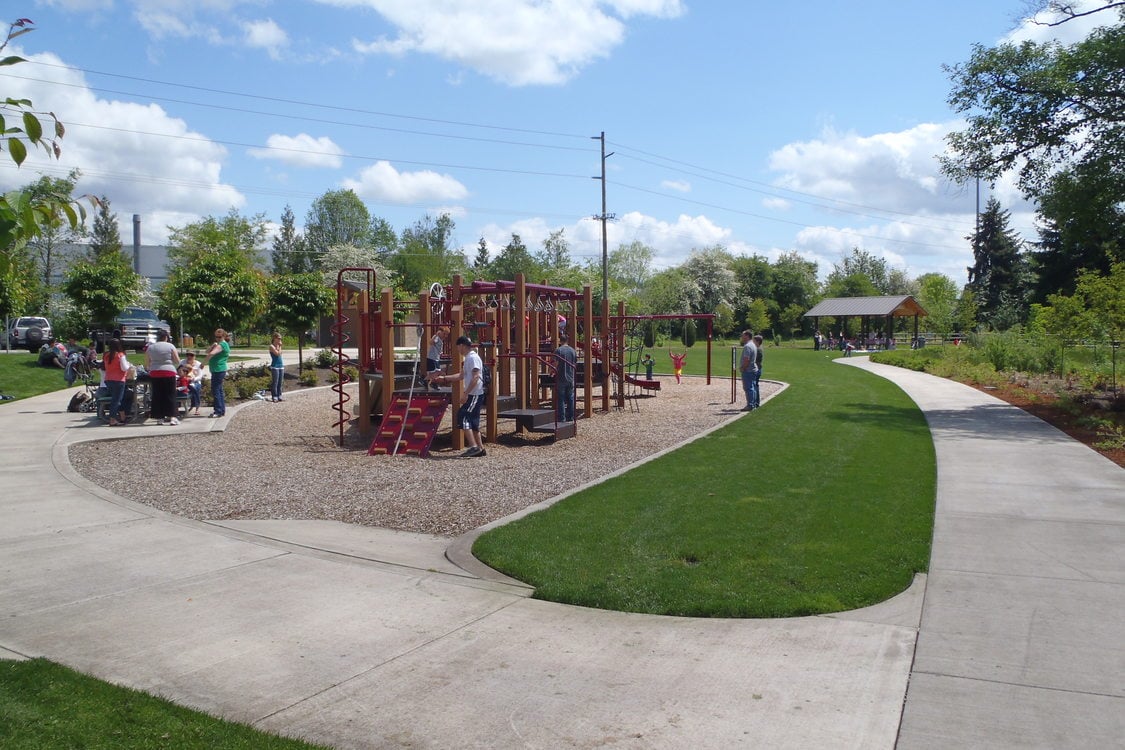 Photo of kids playing on playground