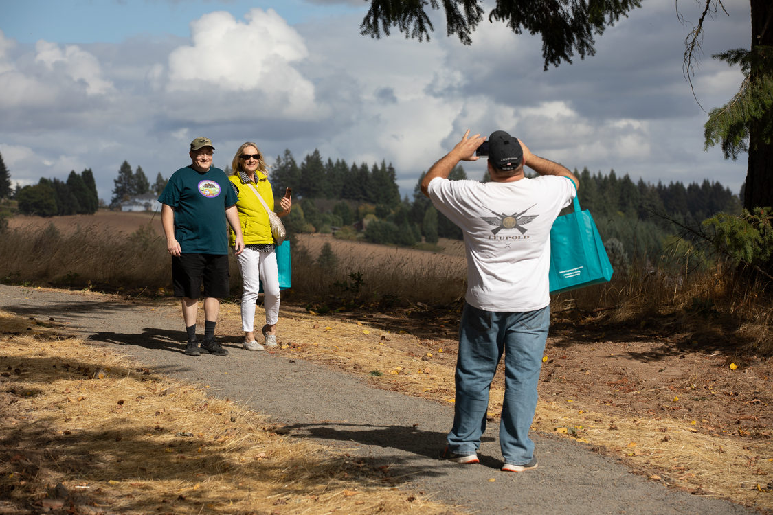 Matt Boyk takes a photo of his mother Diane and brother Cody overlooking farmland at Killin Wetlands.