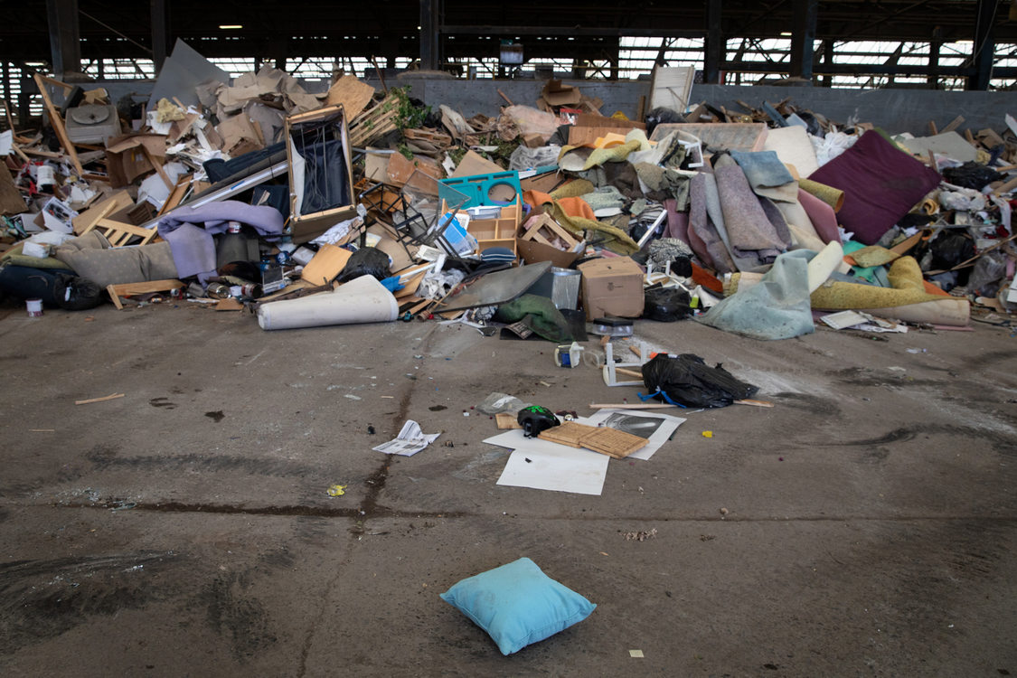 trash and recyclables wait to be sorted at Metro Central 