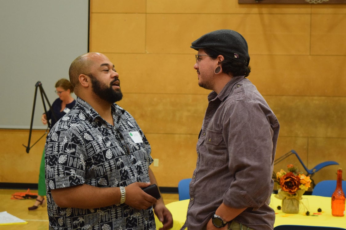 Two men talking after meeting