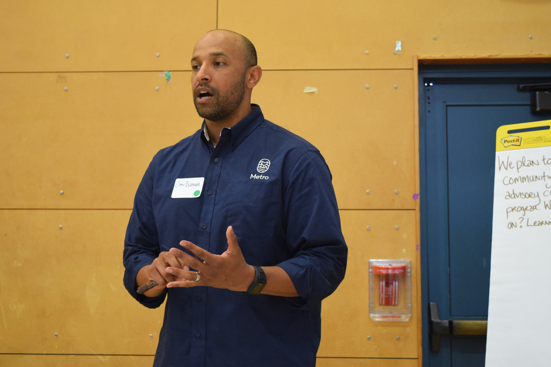 Man speaking to group