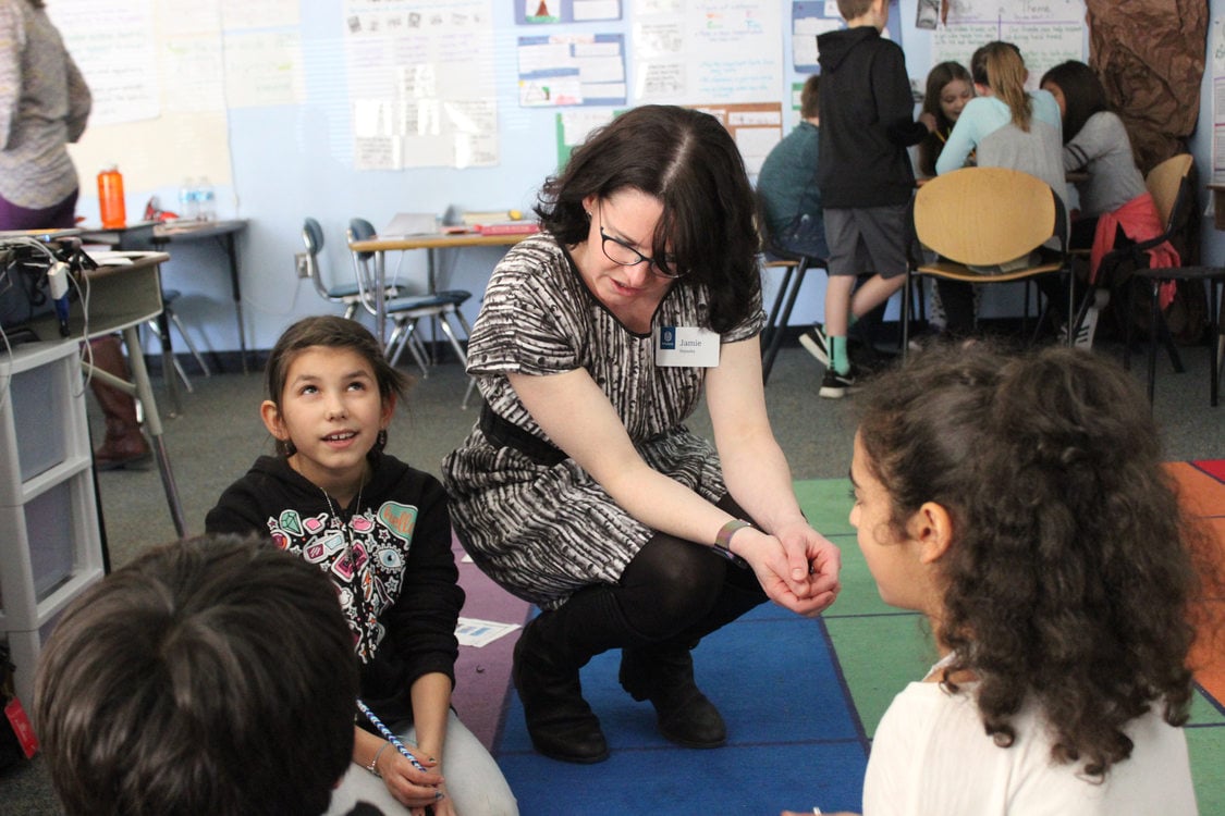 Metro educator speaking to a classroom of students