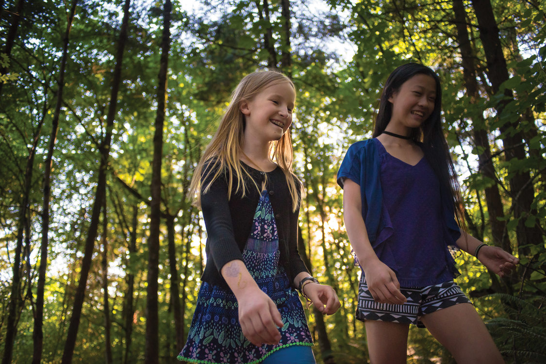 Claire Dolan and Madelyn Joe hike at Mount Talbert Nature Park.