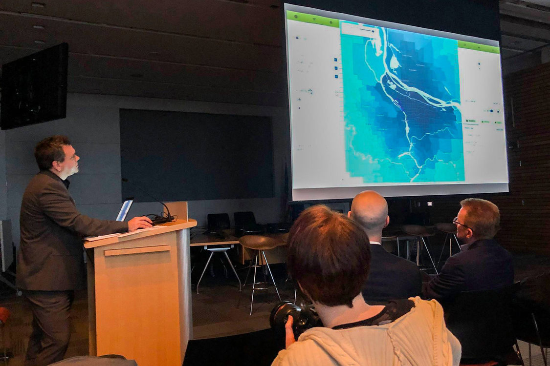 Metro's Jeffrey Raker presents how the economic value atlas tool works to an audience at the launch party in December.